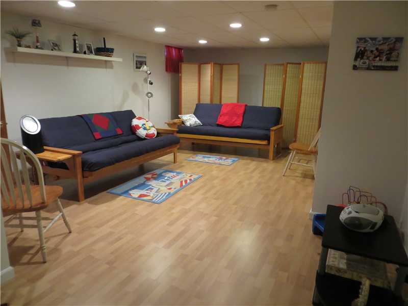 89 Quannacut Road, Unit 89B Westerly, RI 02891 - Photo 22 of 25 Den/Family/Great Room. Den/Family Room