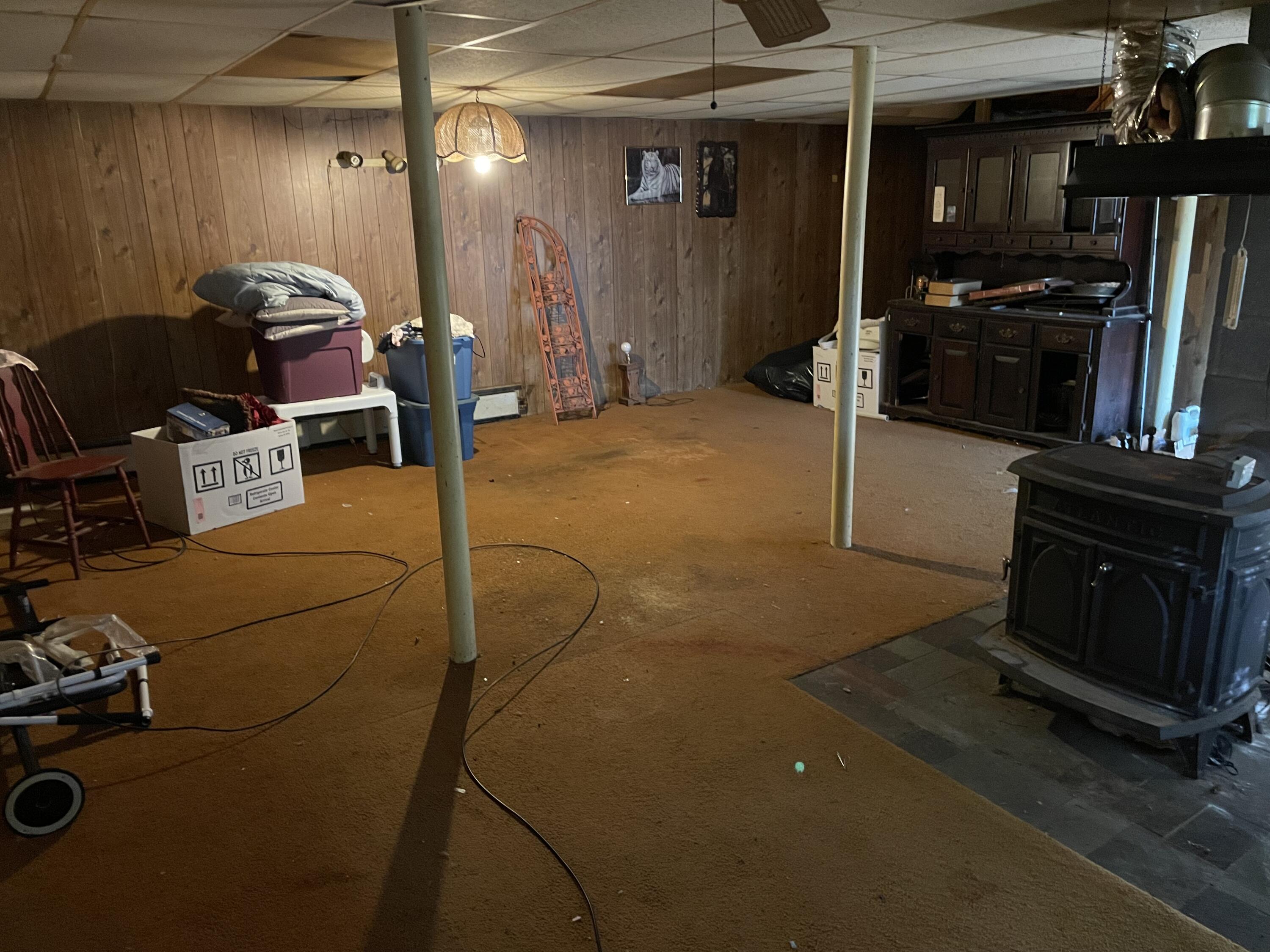 95 Mast Road Falmouth, ME 04105 - Photo 23 of 37 Family room & woodstove