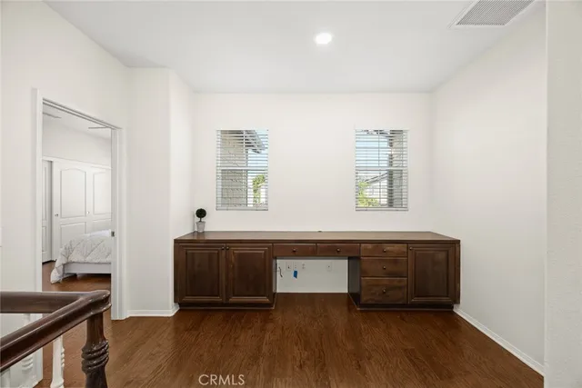 a spacious bathroom with a bathtub and a window