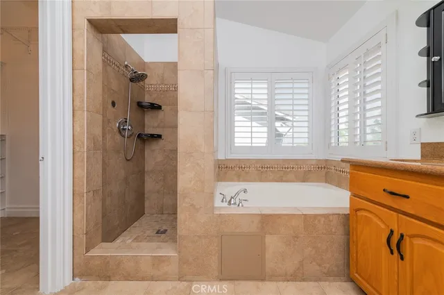 a bathroom with a toilet sink and shower
