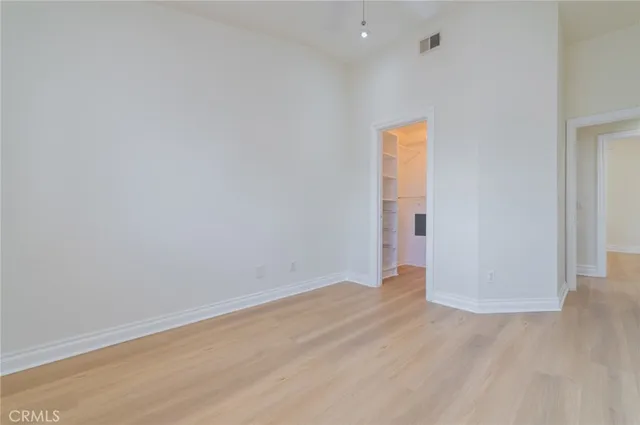 a bathroom with a sink vanity mirror and a bathtub