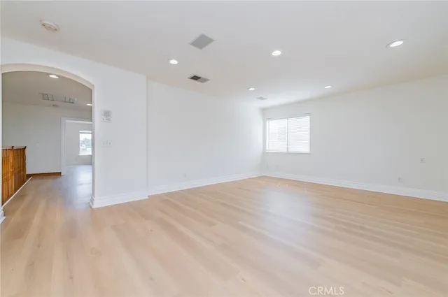 a view of an outdoor dining space with a table and chairs