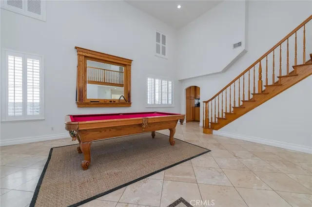 a room with stairs and a table