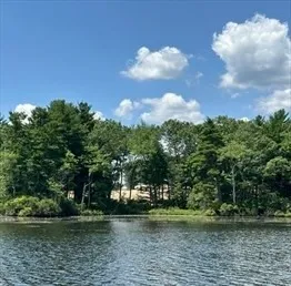 a view of a golf course with a lake