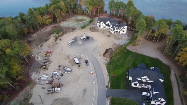 an aerial view of a house with outdoor space
