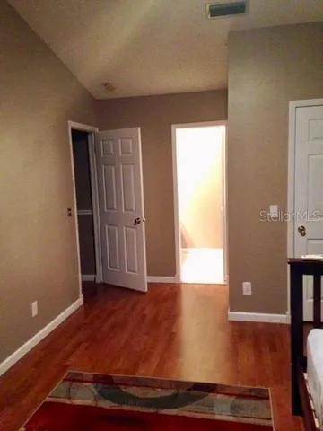 a view of a livingroom with wooden floor