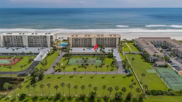 a view of a swimming pool with a seating space