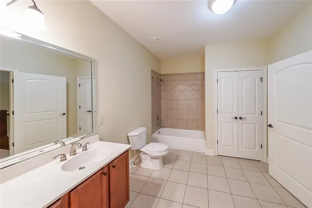 a bathroom with a double vanity sink and mirror