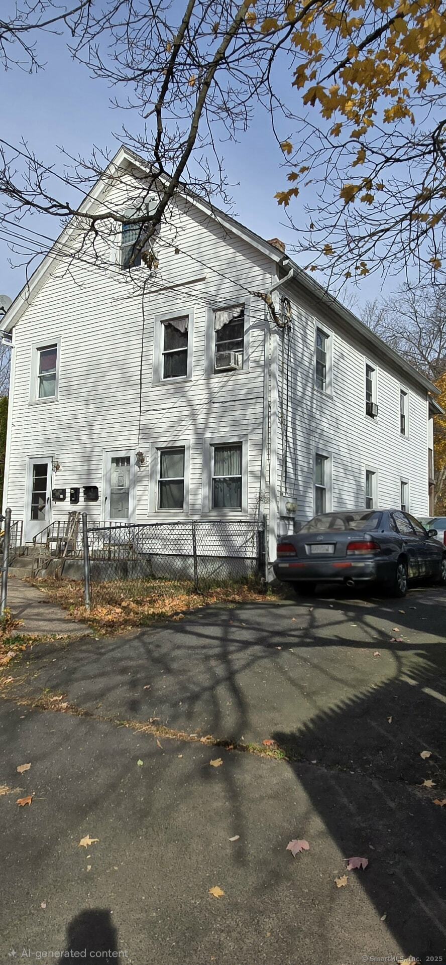 40 Maple Place Middletown, CT 06457 - Photo 3 of 6 a view of a street with houses