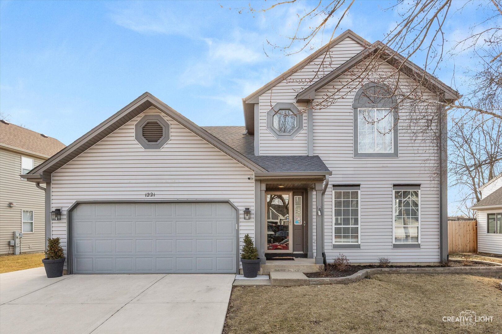 1221 Longford Circle Elgin, IL 60120 - Photo 1 of 29 a view of a house with large windows