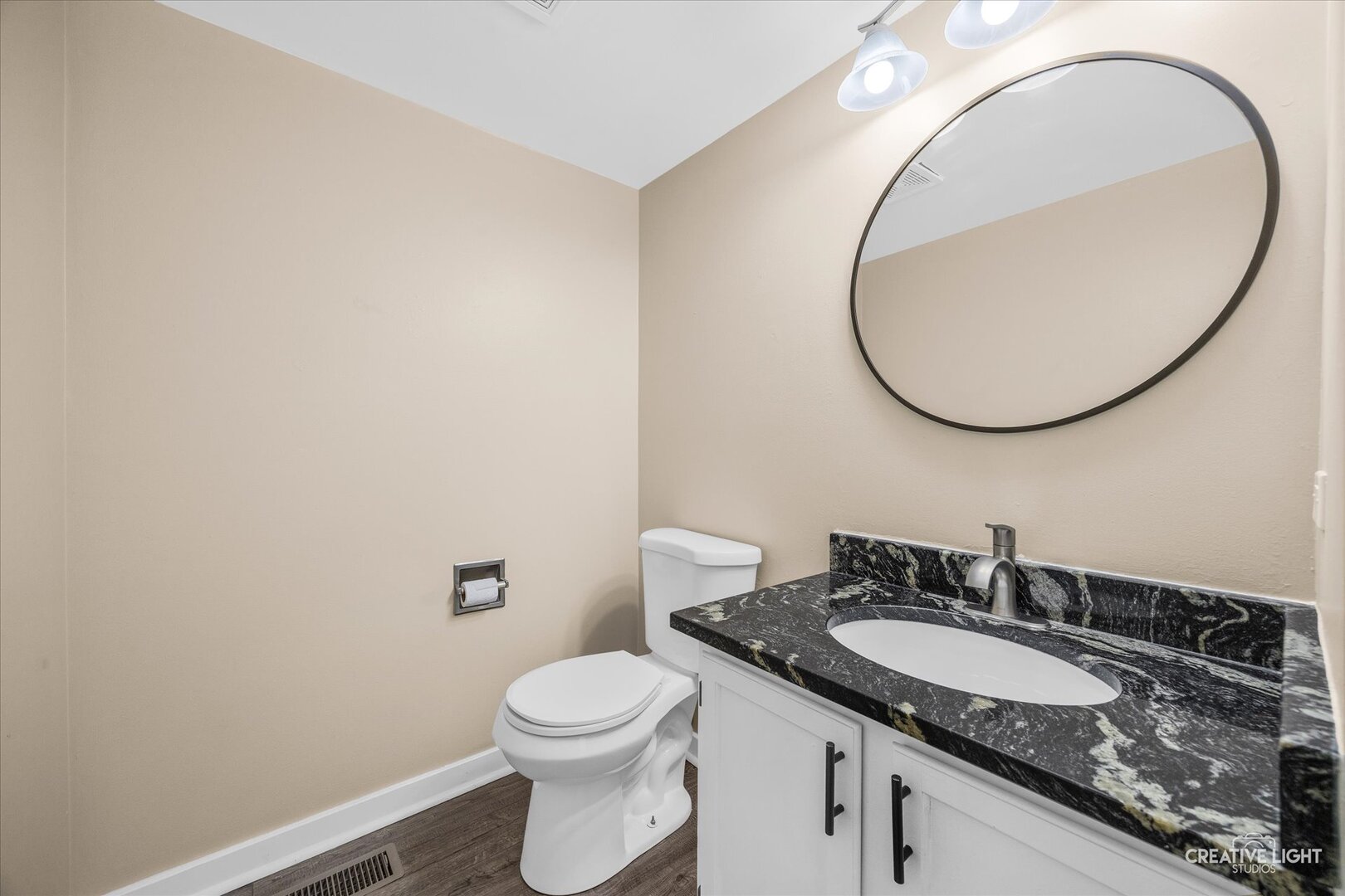 1221 Longford Circle Elgin, IL 60120 - Photo 14 of 29 a bathroom with a granite countertop sink and a mirror