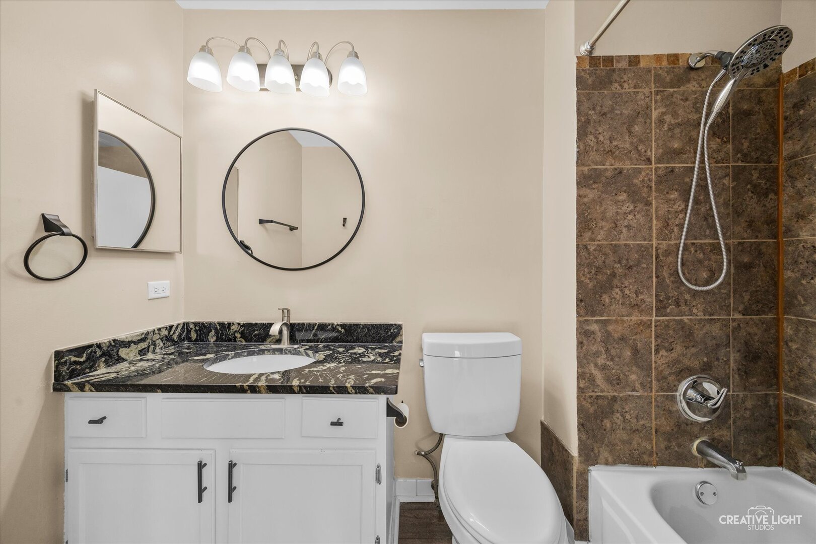 1221 Longford Circle Elgin, IL 60120 - Photo 16 of 29 a bathroom with a granite countertop toilet sink and mirror