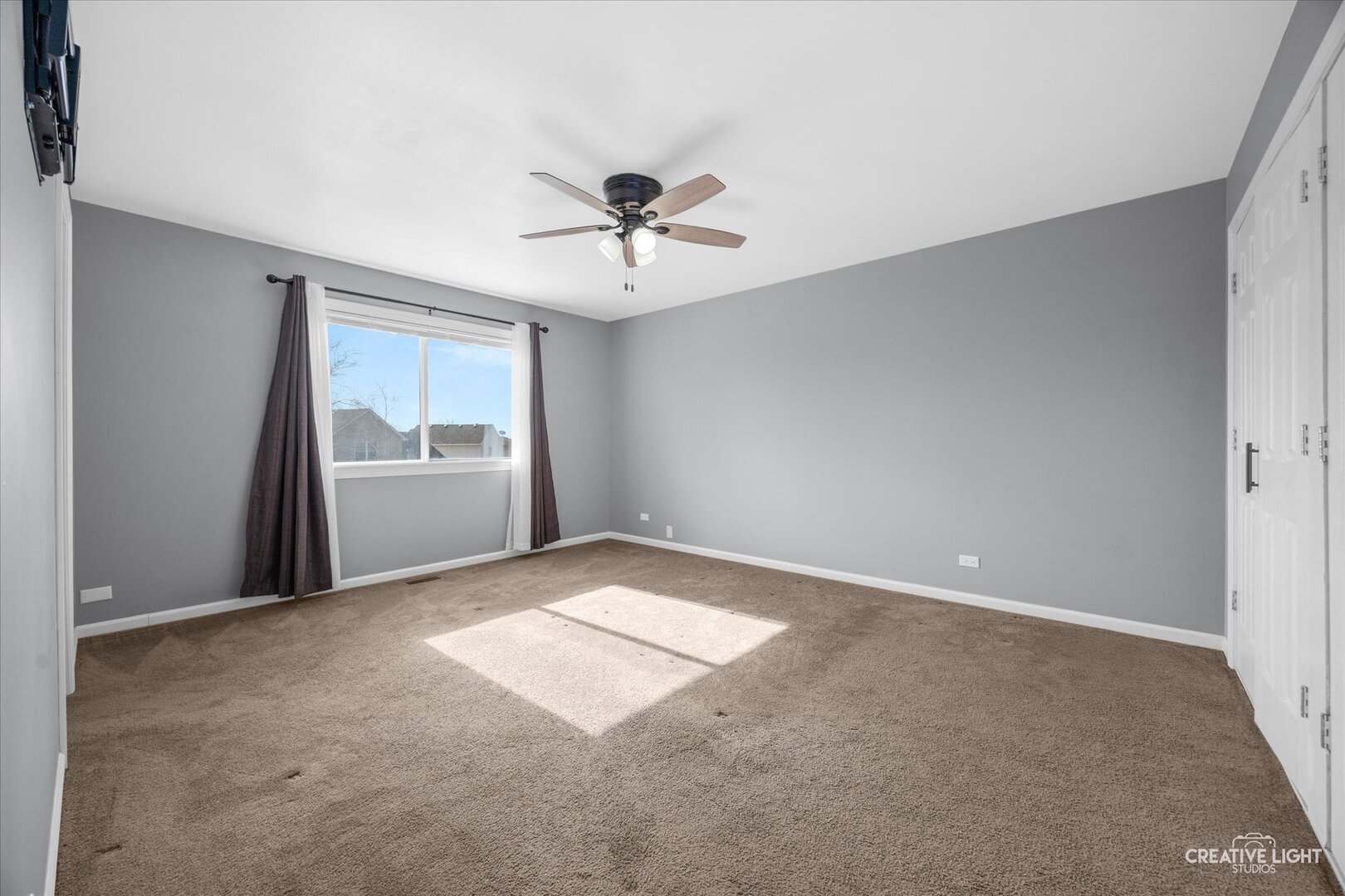 1221 Longford Circle Elgin, IL 60120 - Photo 18 of 29 a view of an empty room with a window