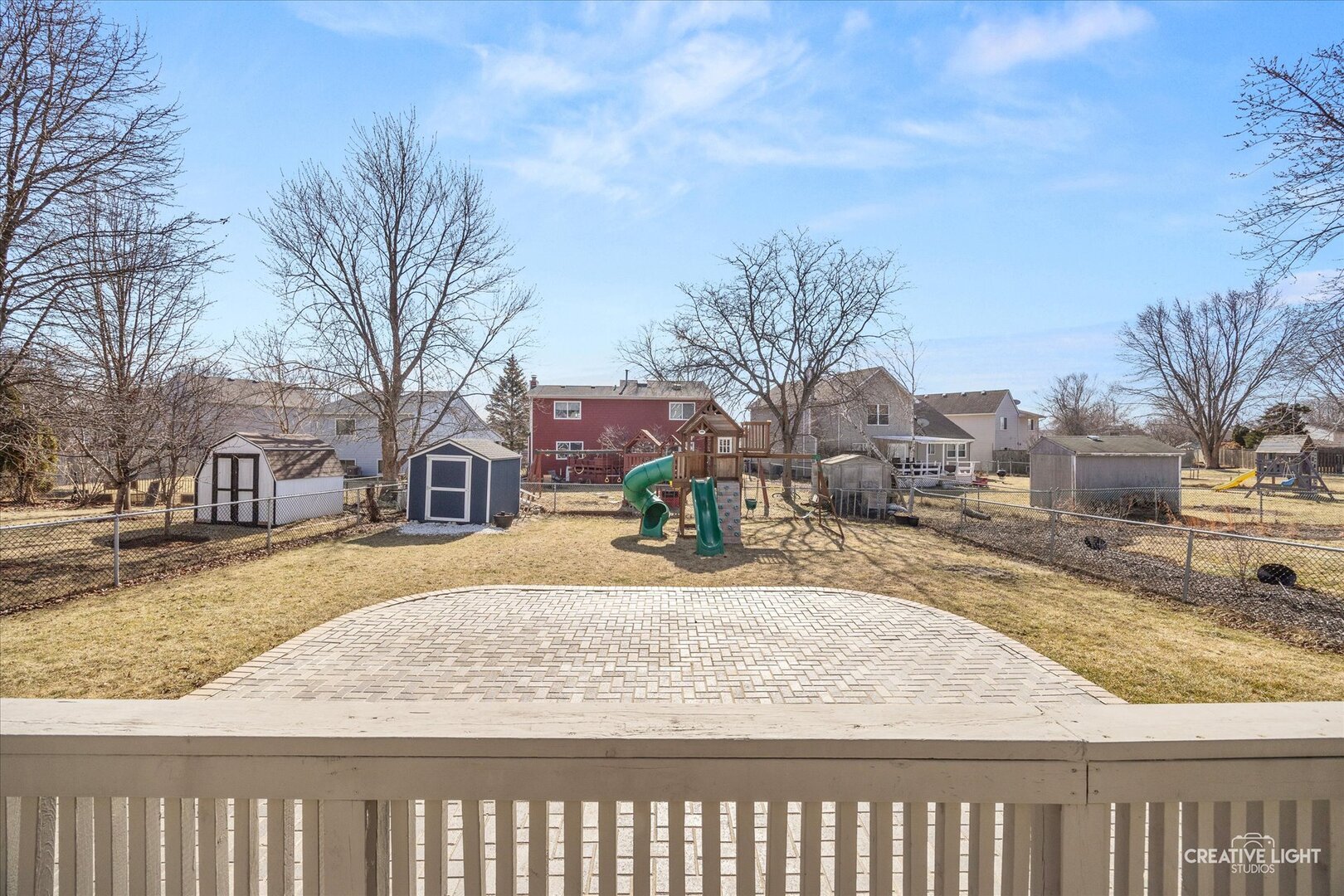 1221 Longford Circle Elgin, IL 60120 - Photo 27 of 29 a view of a yard covered with snow in front of house