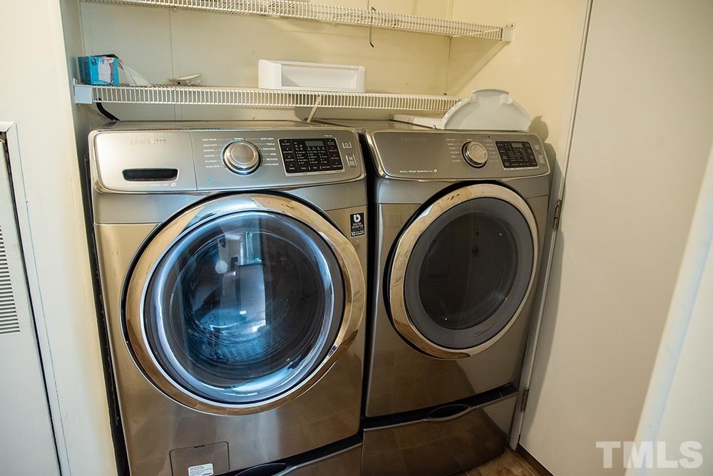 800 Woodsdale Road Roxboro, NC 27574 - Photo 15 of 54 a close up view of washer and dryer
