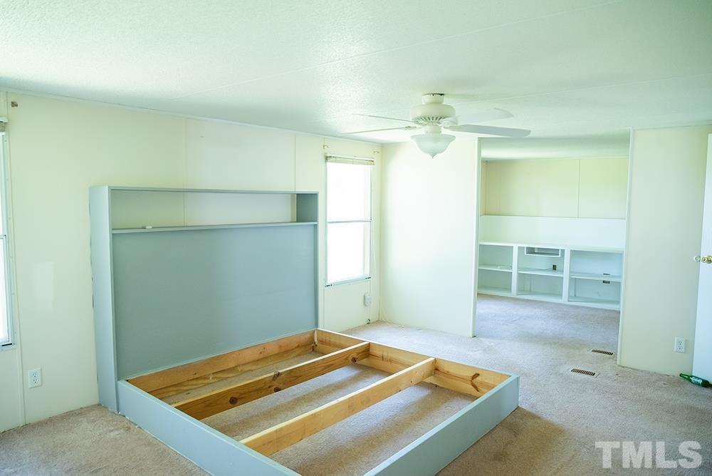 800 Woodsdale Road Roxboro, NC 27574 - Photo 21 of 54 a room with pool table and chandelier