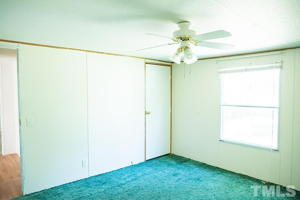 800 Woodsdale Road Roxboro, NC 27574 - Photo 39 of 54 a view of an empty room with a window