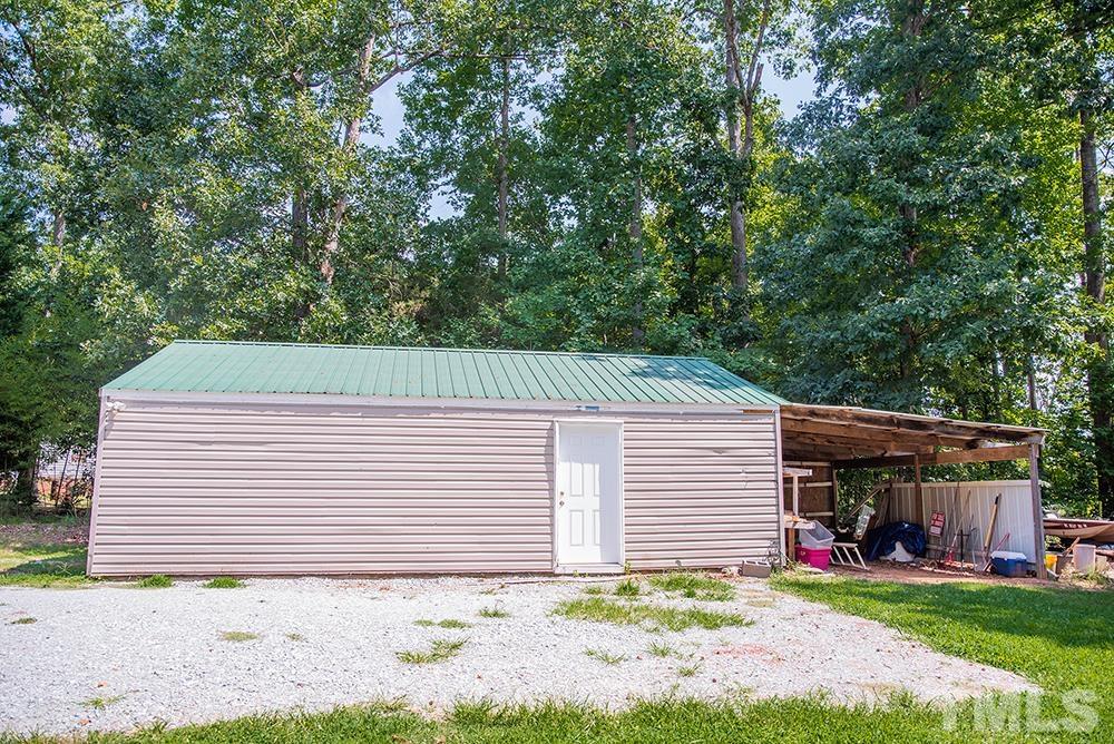 800 Woodsdale Road Roxboro, NC 27574 - Photo 48 of 54 a backyard of a house