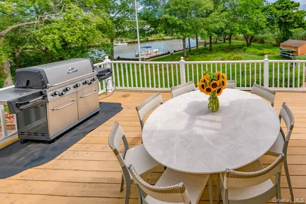 a roof deck view with a seating space