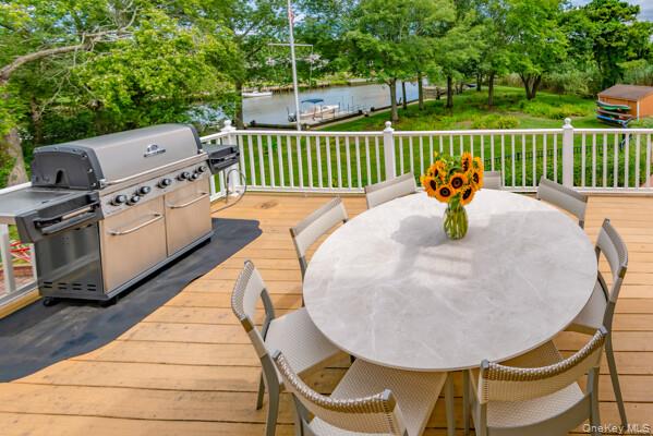 27 West Tiana Road Hampton Bays, NY 11946 - Photo 11 of 21 a roof deck view with a seating space