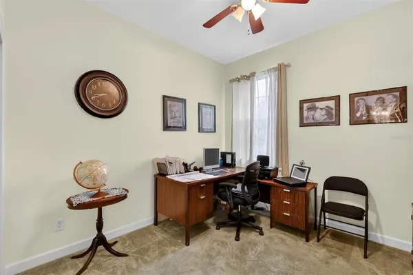 a view of a workspace with furniture