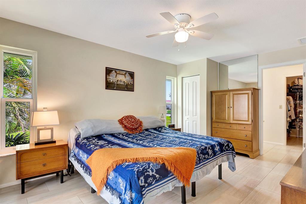 1235 Pine Needle Road Venice, FL 34285 - Photo 27 of 74 a bedroom with a bed and window