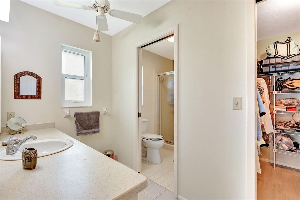 1235 Pine Needle Road Venice, FL 34285 - Photo 30 of 74 a bathroom with a sink and a mirror