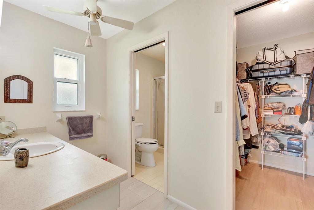 1235 Pine Needle Road Venice, FL 34285 - Photo 33 of 74 a bathroom with a sink a vanity and a mirror