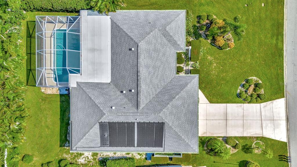 1235 Pine Needle Road Venice, FL 34285 - Photo 46 of 74 an aerial view of a house with garden space