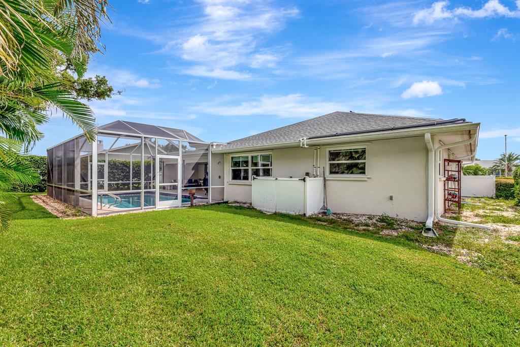 1235 Pine Needle Road Venice, FL 34285 - Photo 55 of 74 a view of a house with backyard