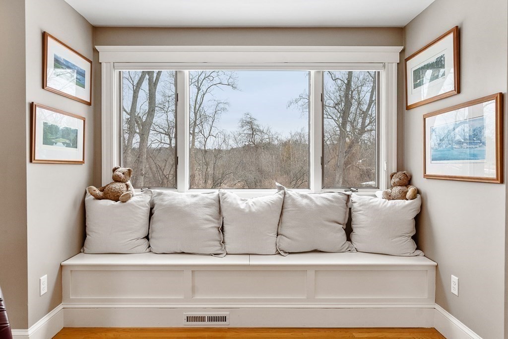 212 Hawthorne Lane Concord, MA 01742 - Photo 18 of 41 a living room with furniture and large window