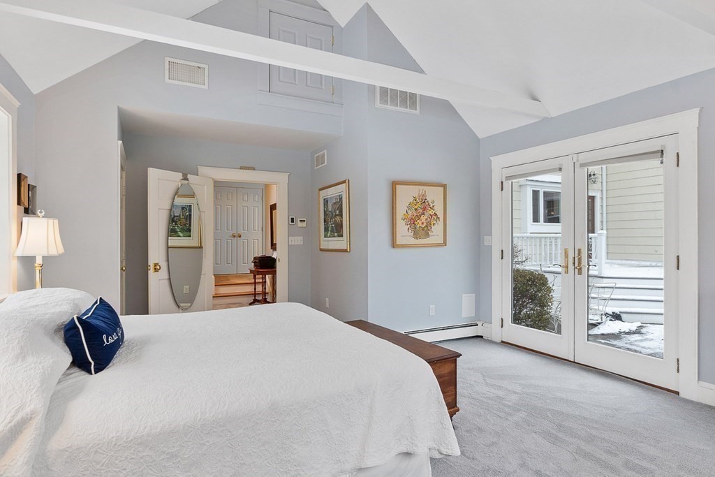 212 Hawthorne Lane Concord, MA 01742 - Photo 20 of 41 a bedroom with a bed and walk in closet