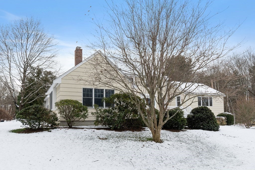 212 Hawthorne Lane Concord, MA 01742 - Photo 35 of 41 a view of a house with a snow in the yard
