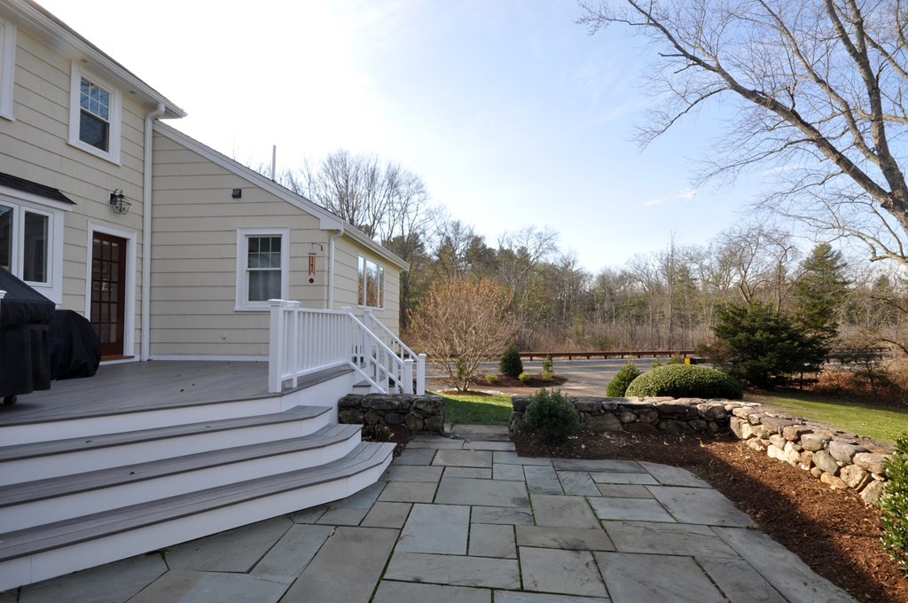 212 Hawthorne Lane Concord, MA 01742 - Photo 40 of 41 a view of a yard with furniture and trees