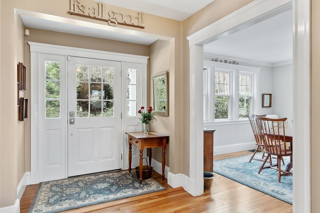 212 Hawthorne Lane Concord, MA 01742 - Photo 4 of 41 a view of a livingroom with furniture and front door