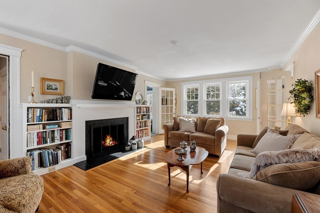 212 Hawthorne Lane Concord, MA 01742 - Photo 5 of 41 a living room with furniture fireplace and flat screen tv