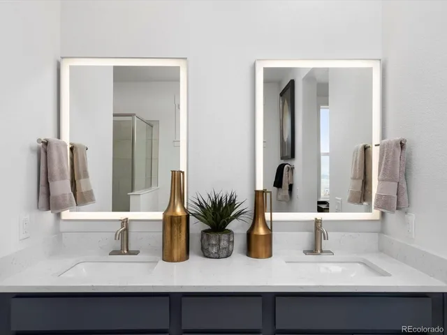 a bathroom with sink and a mirror