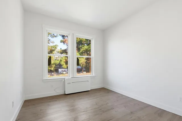 an empty room with windows