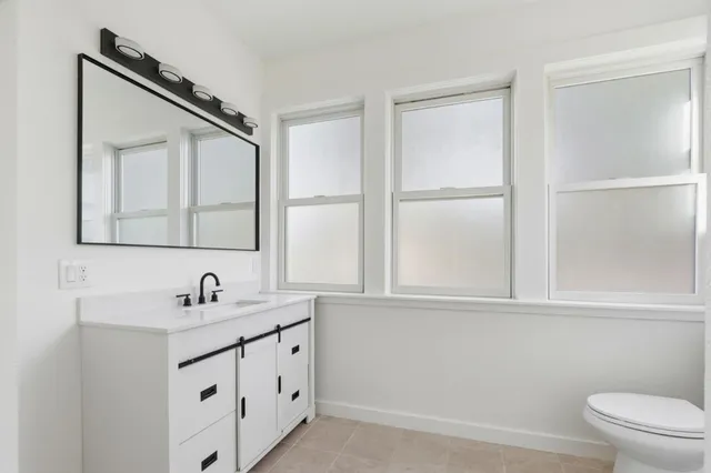 a bathroom with a sink and a toilet
