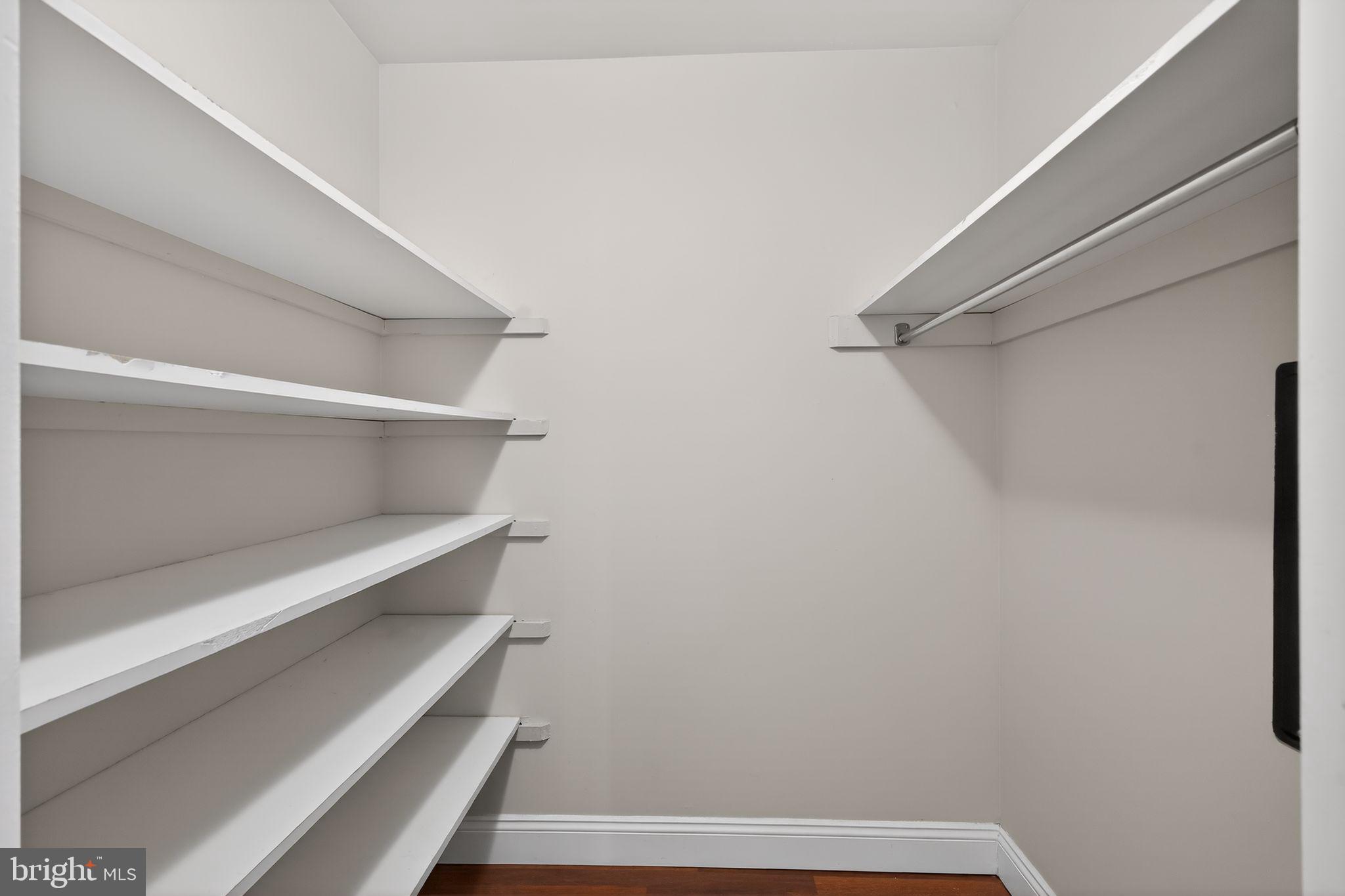 9701 Fields Road, Unit 1904 Gaithersburg, MD 20878 - Photo 26 of 31 a view of walk in closet with empty racks