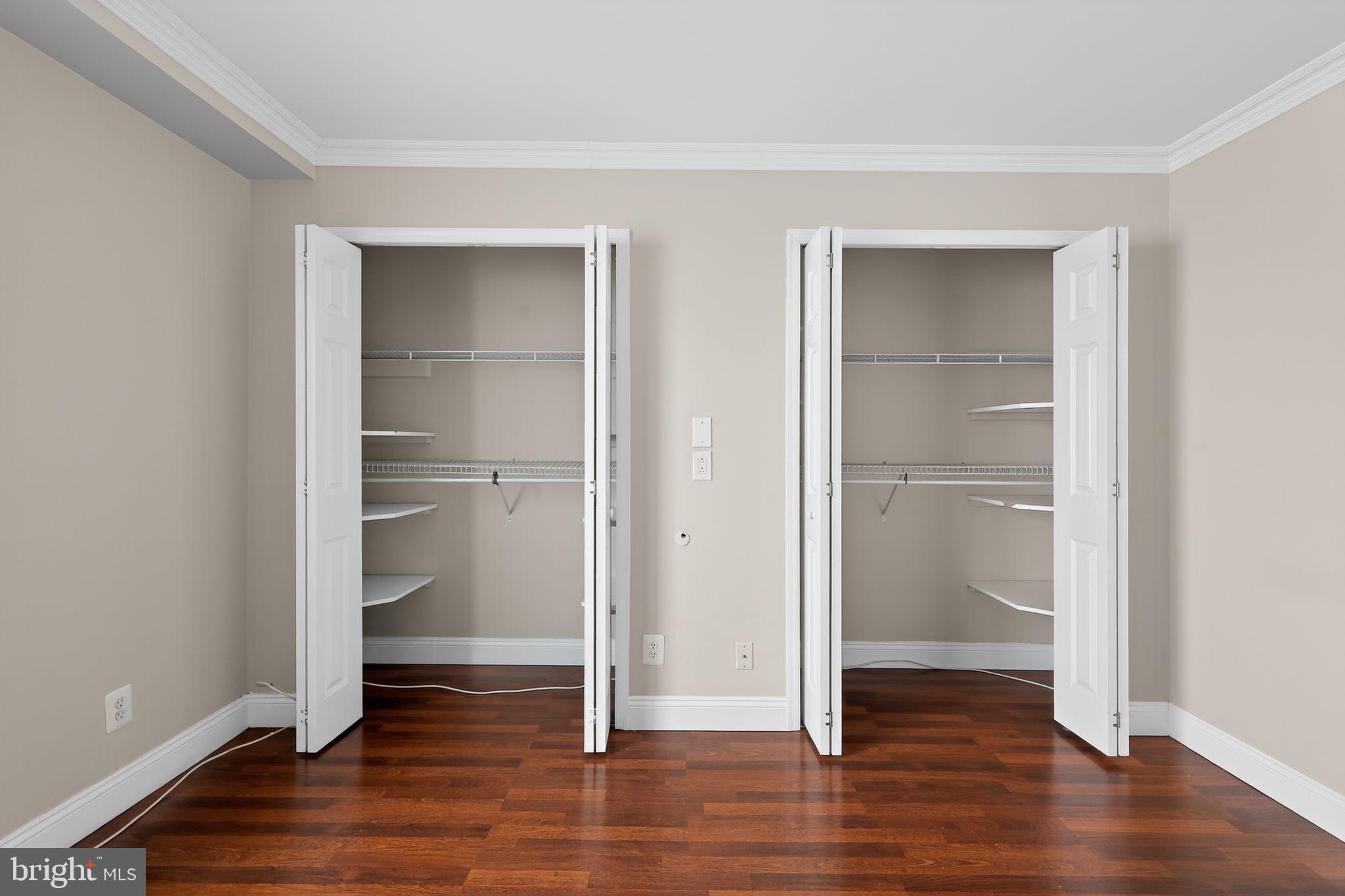 9701 Fields Road, Unit 1904 Gaithersburg, MD 20878 - Photo 27 of 31 a view of empty room with wooden floor
