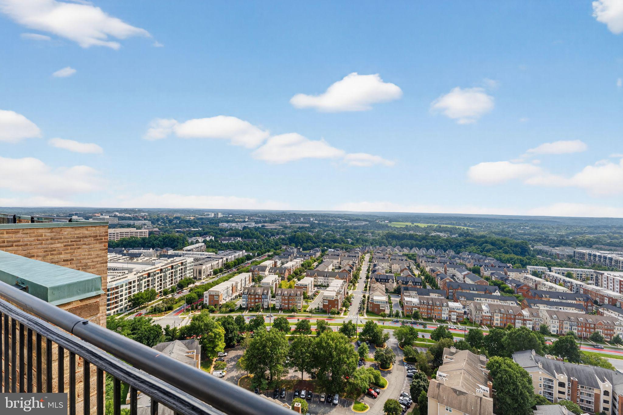 9701 Fields Road, Unit 1904 Gaithersburg, MD 20878 - Photo 31 of 31 an aerial view of city and lake