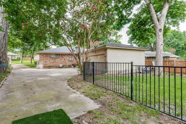 a bathroom with a sink a mirror and shower