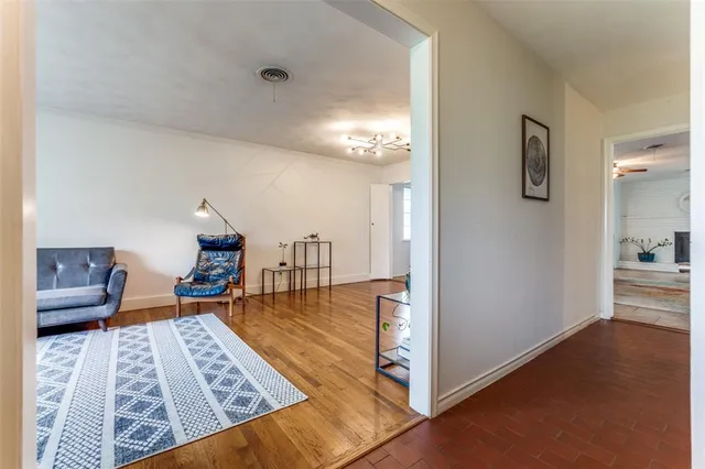a view of a living room and dining room