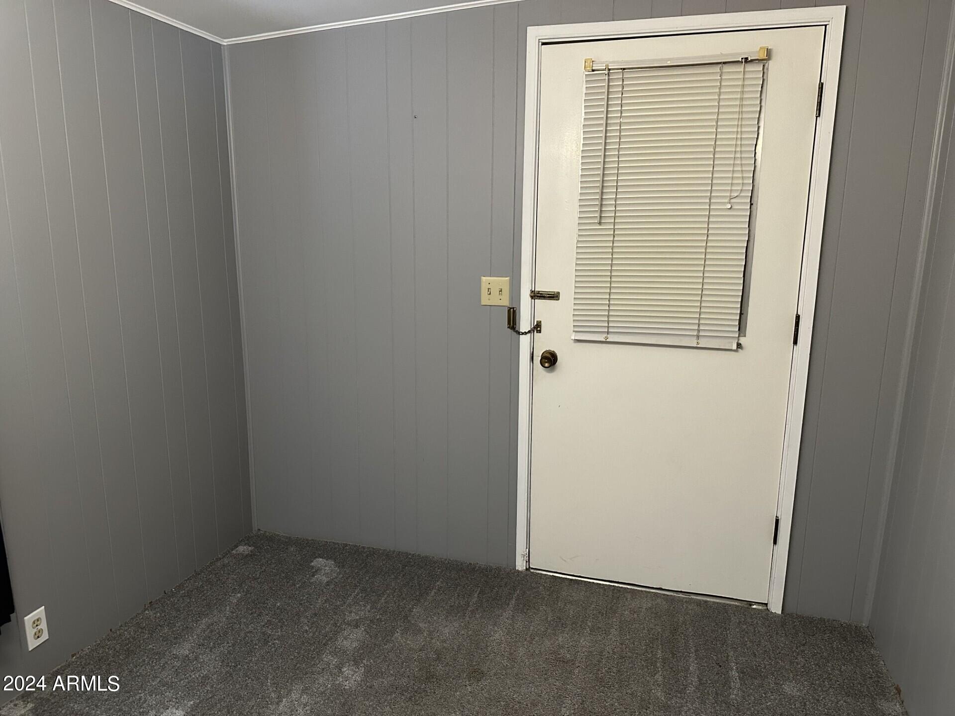 2460 East Main Street, Unit G3 Mesa, AZ 85213 - Photo 19 of 25 an empty room with windows
