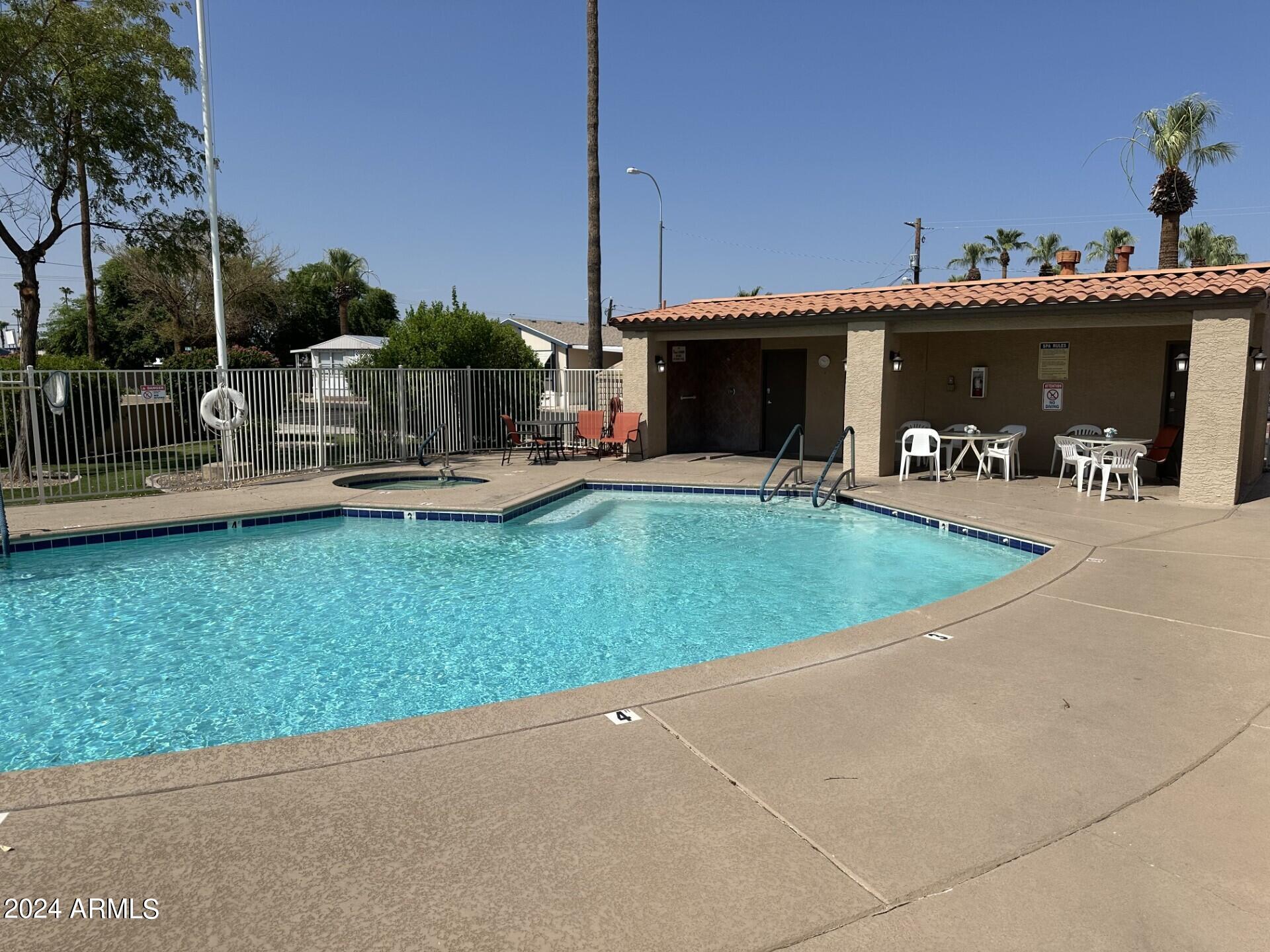 2460 East Main Street, Unit G3 Mesa, AZ 85213 - Photo 24 of 25 a view of a backyard with sitting area
