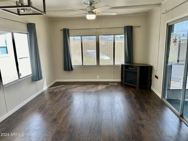 a view of livingroom with hardwood floor and window