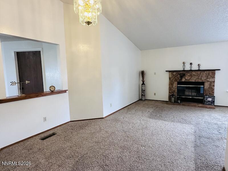 1182 Blue Lakes Road Reno, NV 89523 - Photo 21 of 31 a view of empty room with a fireplace