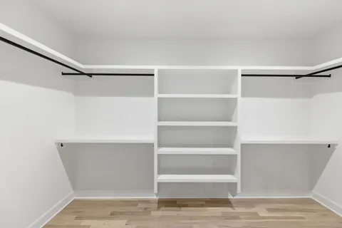 a view of an empty walk in closet