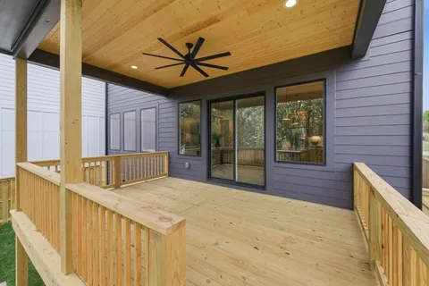 a view of swimming pool with a balcony